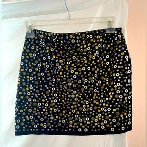 Bailey 44 Studded Mini skirt with gold and silver studs and thick black fabric